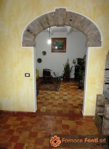 Pavimento in cotto rosso e giallo