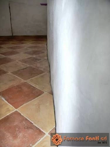 Restauro di pavimentazione a scacchiera con tavella rossa e gialla