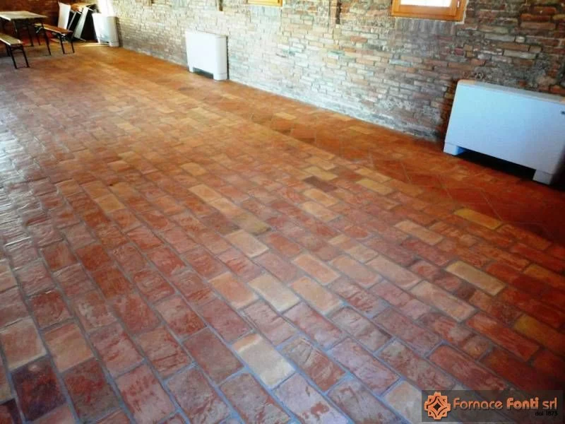 Restauro con tavella a mano lavata