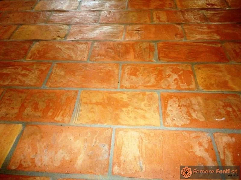 Restauro con tavella a mano lavata