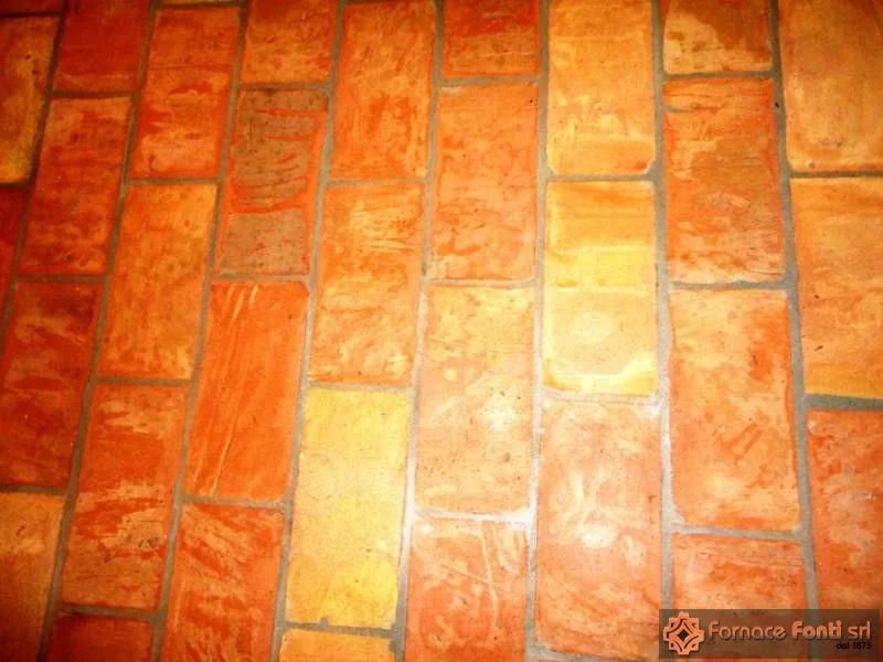 Restauro con tavella a mano lavata